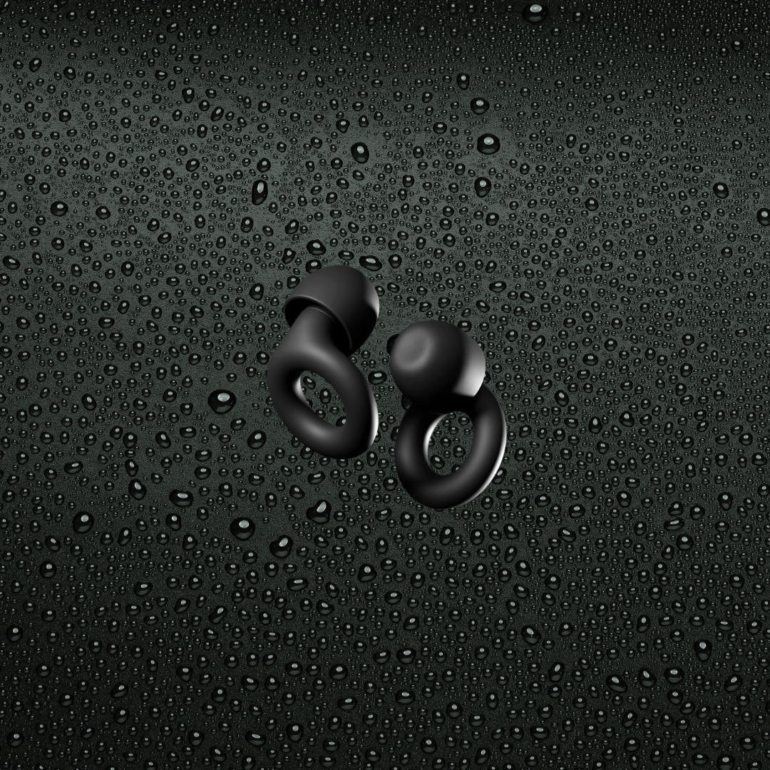 Black ear plugs with black background with water droplets-Mularx